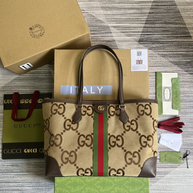 G*u*i shopping bags
